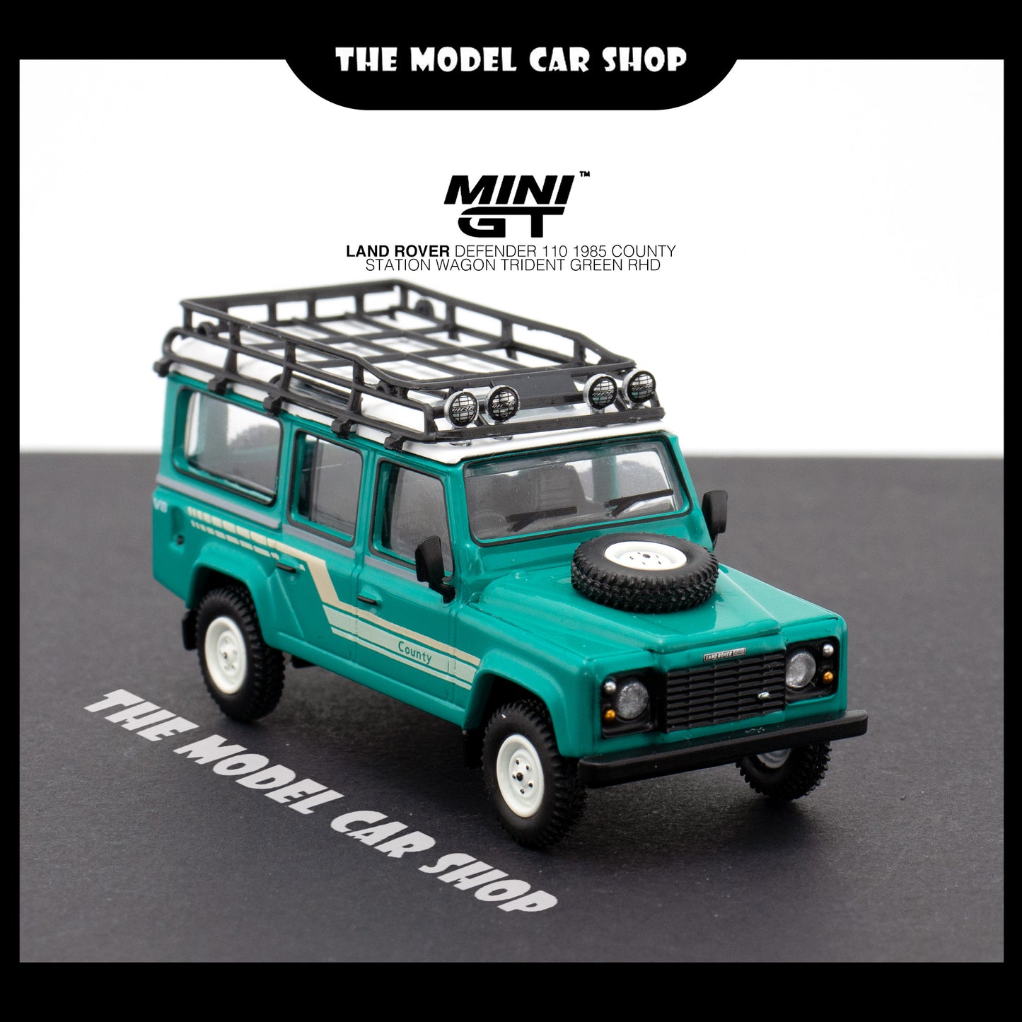 [MINI GT] Land Rover Defender 110 1985 County Station Wagon - Trident Green