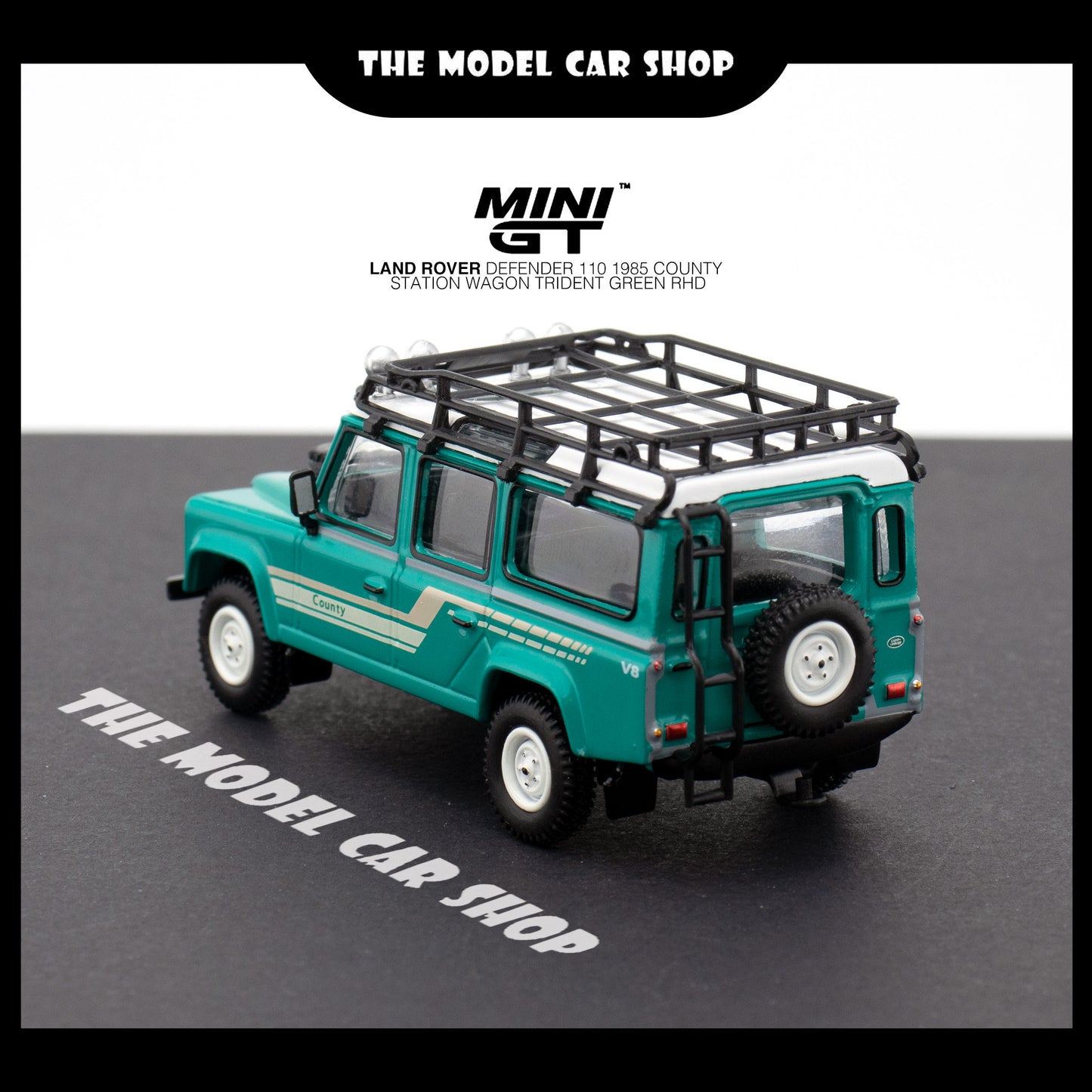 [MINI GT] Land Rover Defender 110 1985 County Station Wagon - Trident Green